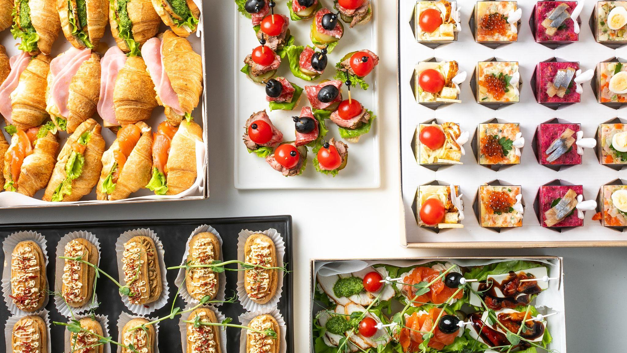 Elegant assortment of croissant sandwiches, canapés, and hors d’oeuvres for Seattle holiday catering by Chef Dane Catering.