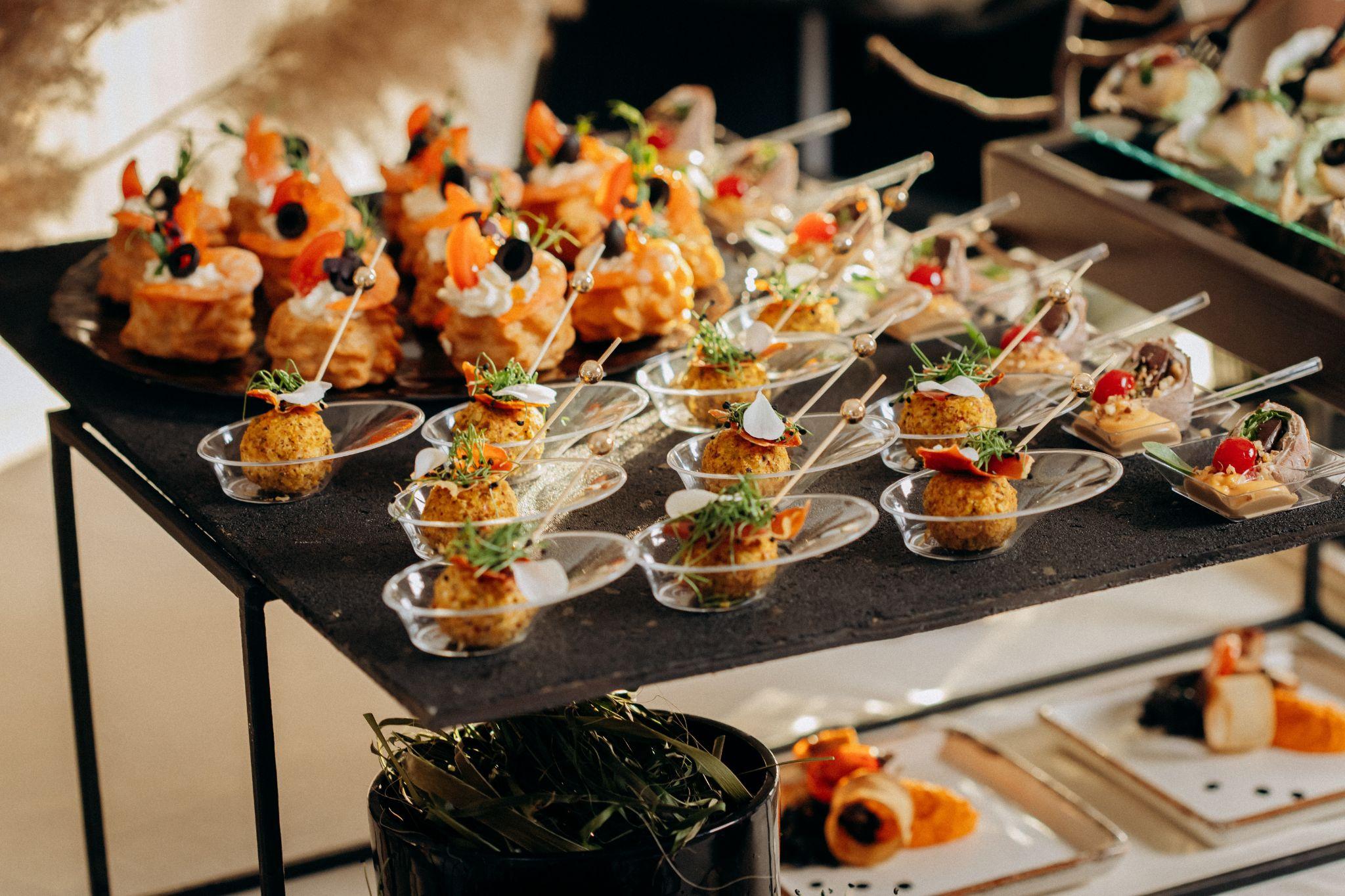 Assorted wedding hors d’oeuvres and canapés on display