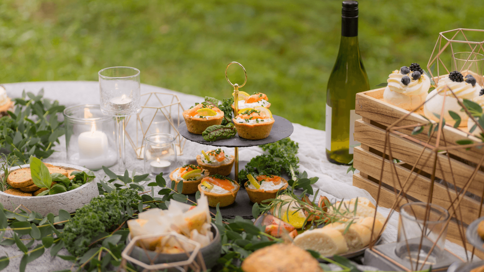 A platter of leafy vegetables and pastries